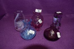 A selection of art glass paper weights including four pieces marked Caithness