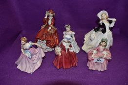 A selection of Royal Doulton figurines including Invitation and Top of The Hill