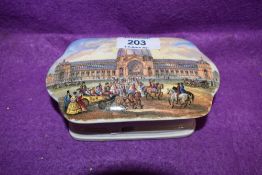 An unusual shaped container with prat ware pot lid depicting Victorian train station or similar