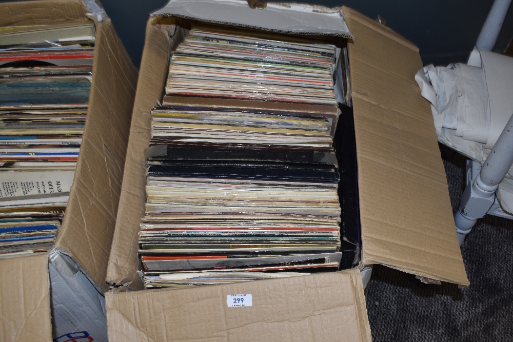 A selection of vinyl records and albums including pop and rock interest