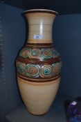 A large Royal Cauldon vase 51 cm tall hand decorated in a Charlotte Reid style with peach and