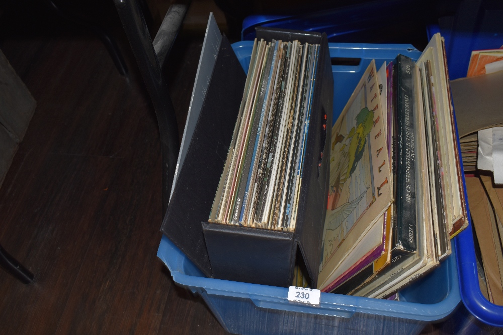 A selection of vinyl records and albums including pop and rock interest