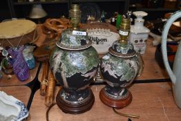 Two table or similar lights in a ginger jar design with oriental imagery