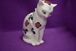 A ceramic figure of a cat stamped London England Plichta from the Wemyss Bovey designs having