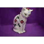 A ceramic figure of a cat stamped London England Plichta from the Wemyss Bovey designs having