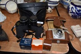 A pair of Greencat binoculars 8x40 in case and Silette vario camera