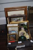 A selection of picture frames and prints