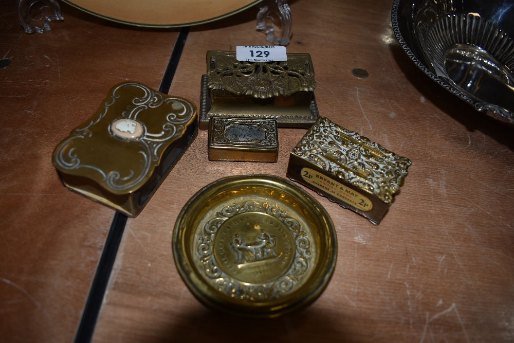 A selection of antique and later vesta match box cases and similar brass stamp box