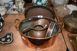 A selection of copper wares including JS and S bowl and copper kitchen steamer