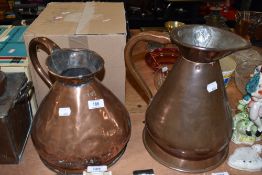 Two large copper water or similar jugs one marked one gallon