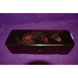 A Japan lacquer glove box or similar decorated with birds and flowers