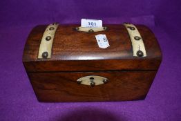 An antique mahogany cased with bone and brass stud detailing in the form of a treasure chest both
