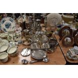 A fine selection of various plated table wares including trays candle sticks and cutlery