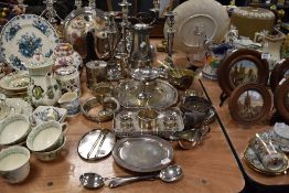 A fine selection of various plated table wares including trays candle sticks and cutlery