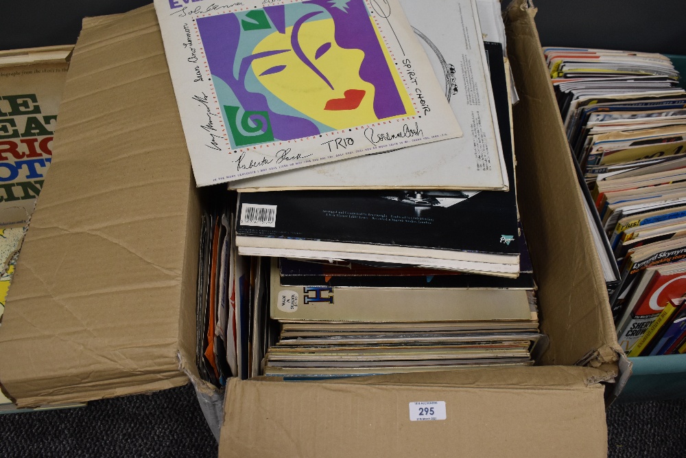 A selection of vinyl records and albums including pop and rock interest