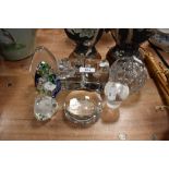 A selection of clear cut crystal glass paper weights