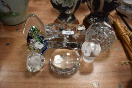 A selection of clear cut crystal glass paper weights