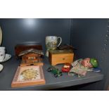A selection of musical jewellery boxes and ceramic headed puppet