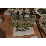 An early 20th century ceramic model house by the Leeds pottery company in good condition