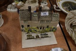 An early 20th century ceramic model house by the Leeds pottery company in good condition