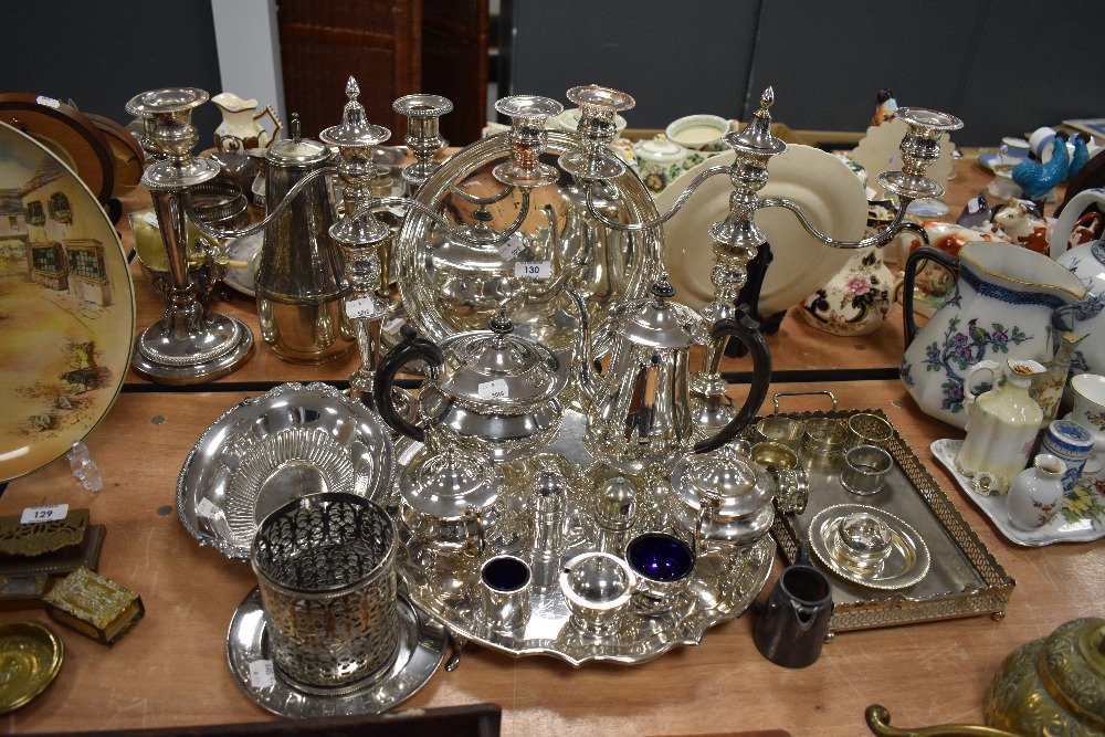 A selection of fine silver plated wares including tea set and tray and pair of candelabra