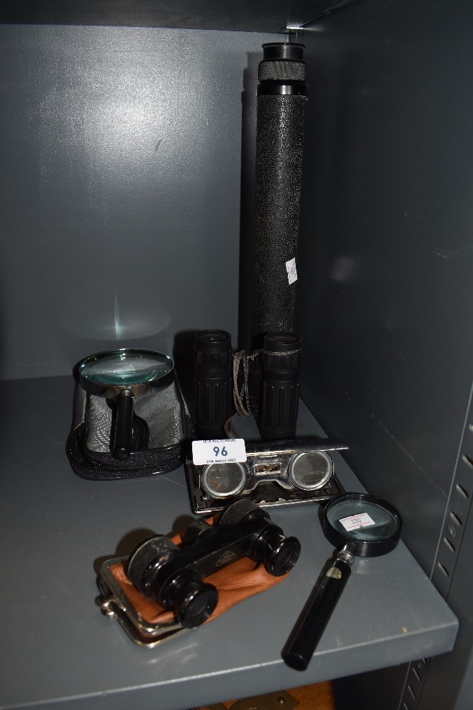 A selection of optical devices including binoculars and fold out opera glasses