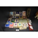 A selection of poker and playing cards including bridge and poker dice