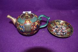 Two antique hard paste porcelain ceramics highly decorated in a Middle eastern design bearing