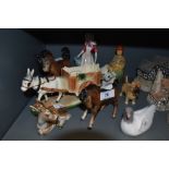 A selection of figures and figurines including Royal Doulton Jersey Milkmaid HN2057, Wade Strawberr