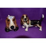 A ceramic figure of a Basset hound by Cooper Craft and similar mug