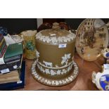An impressive Jasperware stilton dome in the styled f Wedgwood with biscuit coloured ground and