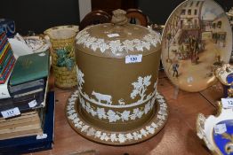 An impressive Jasperware stilton dome in the styled f Wedgwood with biscuit coloured ground and