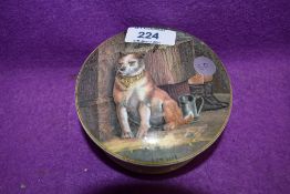 An antique pratt ware pot and lid depicting dog titled low life