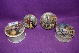 A selection of four small antique pratt ware pot lids