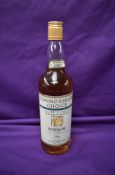 A bottle of Connoisseurs Choice Lowland Single Malt Scotch Whisky, Distilled in 1988 at Rosebank