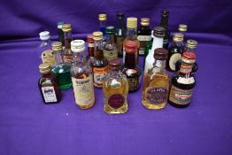 A selection of seventeen miniatures including Tandhu 10year old, Cardhu 12 year old, Glayva,