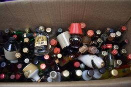 A box of Miniatures including Cossack Vodka, Martel Cognac, Cornish Mead, Lambs Navy Rum etc