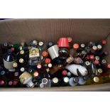 A box of Miniatures including Cossack Vodka, Martel Cognac, Cornish Mead, Lambs Navy Rum etc