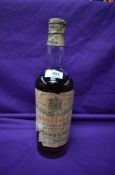 A 1929 bottle of John Dewar and Sons White Label Finest Scotch Whisky of Great Age with spring
