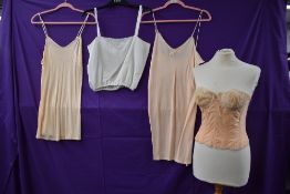 A varied lot of lingerie including 1920s camisole,two slips, one having CC41 utility label and a