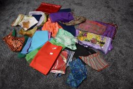 A variety of colourful vintage scarves.
