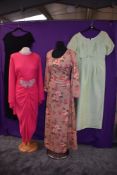 Four vintage dresses, around late 1960s to 1970s including vibrant pink Carnegie dress, and floral