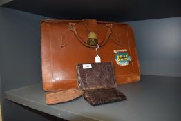 A vintage brief case/ bag having BOAC sticker to front and three vintage purses/wallets.