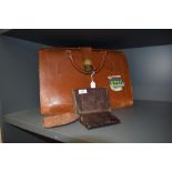 A vintage brief case/ bag having BOAC sticker to front and three vintage purses/wallets.