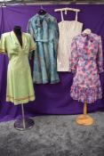 A collection of 1960s and 70s dresses, some unusual patterns and styles.