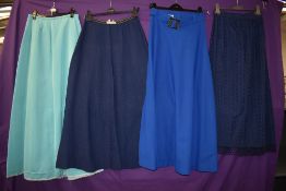 Four vintage 1960s to early 70s maxi skirts including Susan Barry and Go-Del