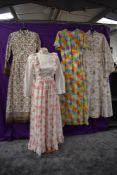 Four colourful 1960s maxi dresses,some beautiful prints, small to medium sizes.