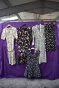 Five retro dresses having bright patterns and varying styles including 1980s Frank usher dress.