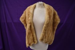 A 1950s blonde mink stole having Blackpool furriers label.