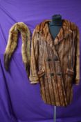 A vintage mahogany coloured fur coat with pockets to front,fully lined,medium size approx, also